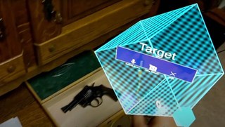 Through HoloLens: a revolver marked as a target in a drawer